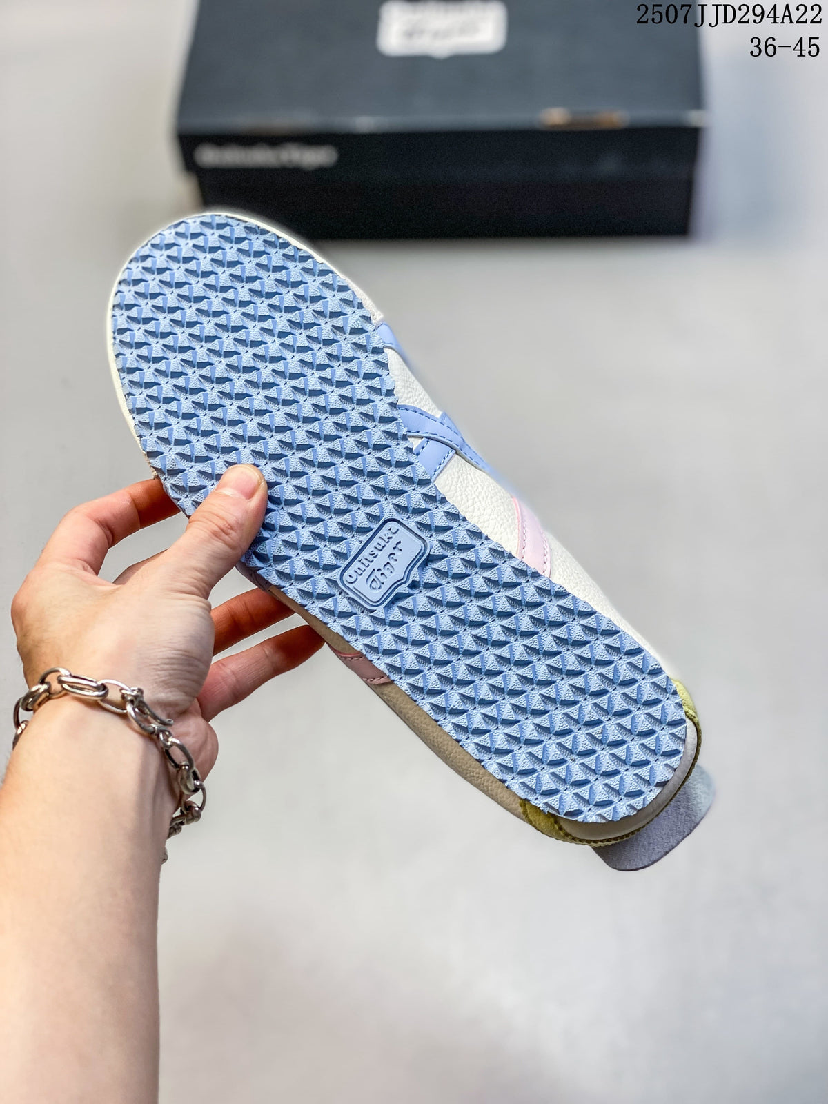 Close-up of the blue patterned outsole on an Onitsuka Tiger sneaker.