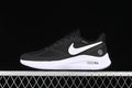Side view of black Nike Zoom Winflo 7 shoes with white Swoosh and midsole