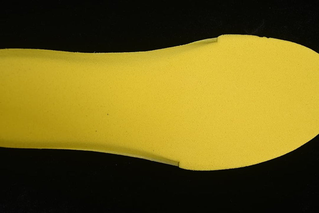 Yellow shoe insole viewed from above