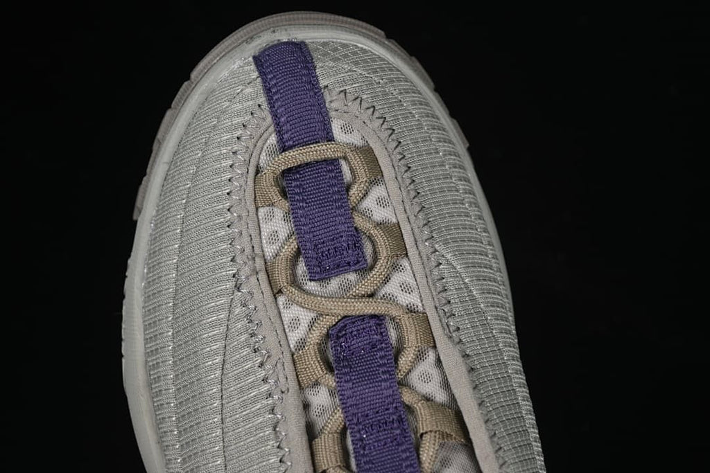 Top view showing the laces, webbing loops and textured upper.