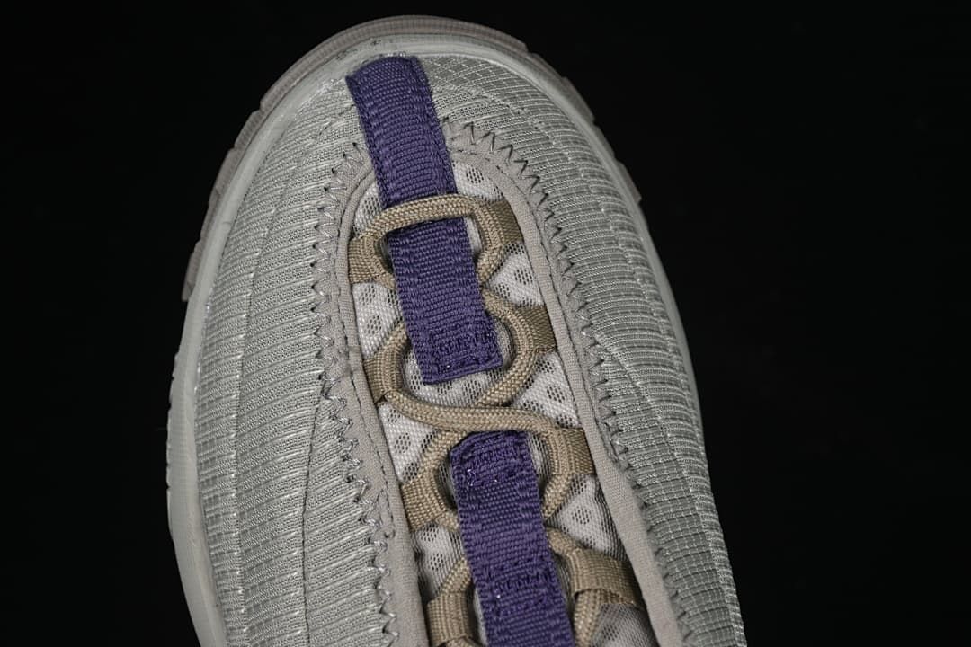 Top view showing the laces, webbing loops and textured upper.