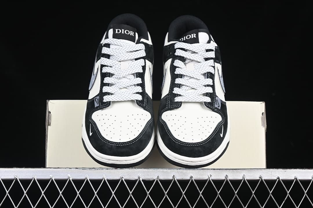 Front view of the pair showing perforated toe boxes and patterned laces.