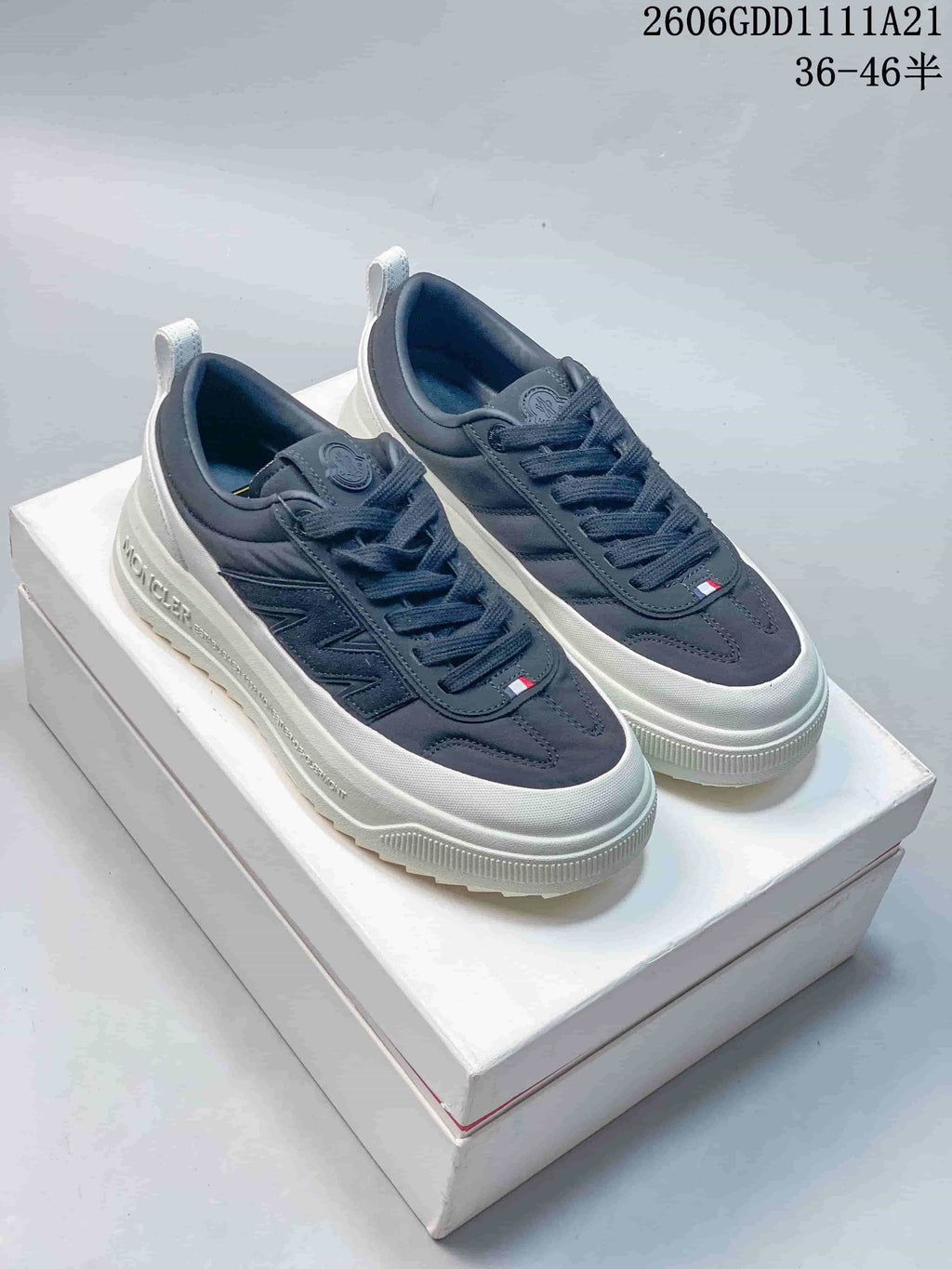 Pair of navy Moncler Altive low-top lace-up sneakers with white soles