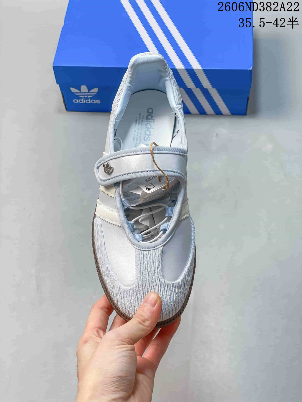 Top-down view of an Adidas Samba Jane sneaker showing its strap and toe detailing.
