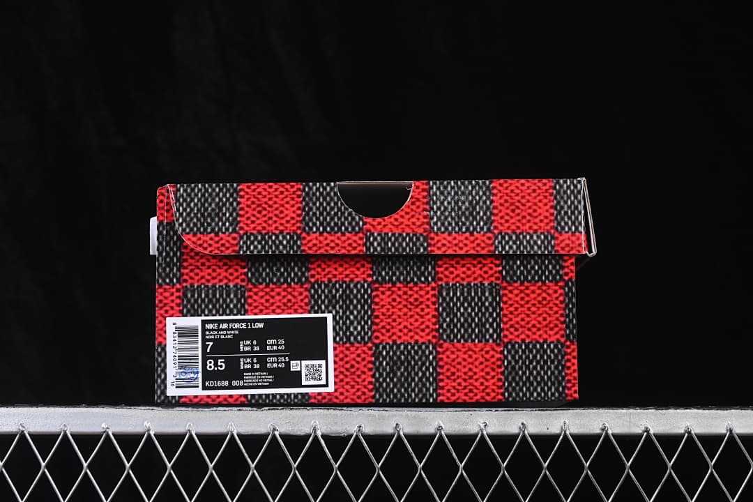 Red and black patterned shoe box with a label identifying Nike Air Force 1 Low and style code KD1688-008