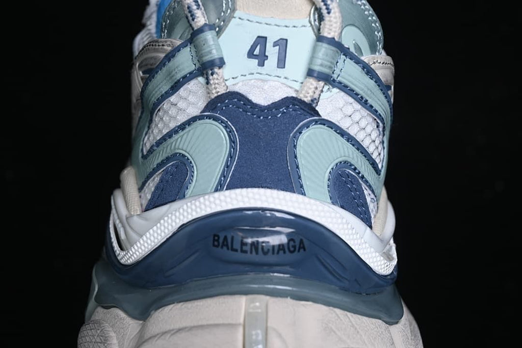 Rear view of the sneaker showing layered panels and size marking 41