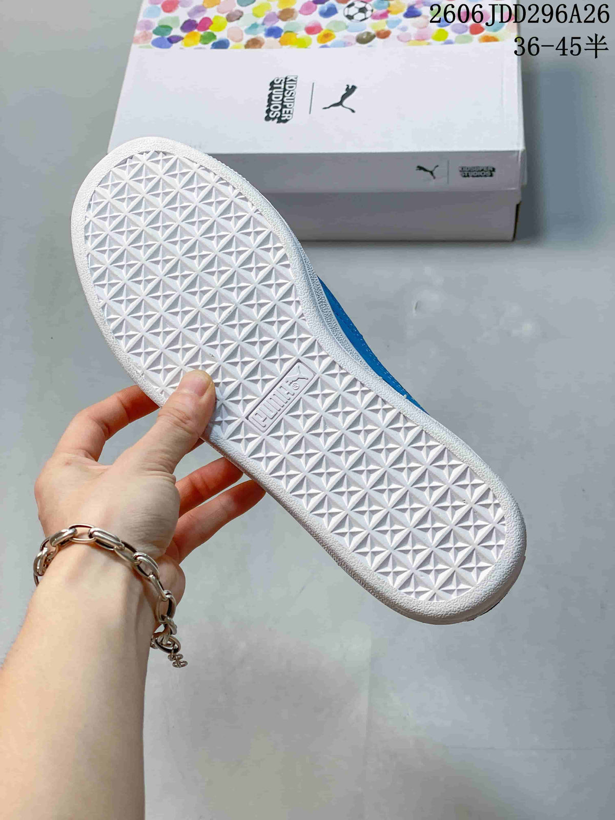 Close-up of the white patterned outsole on a PUMA sneaker.