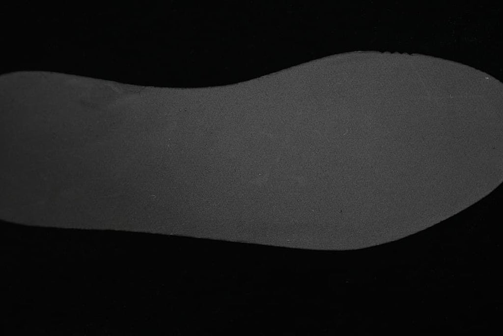 Close-up of the sneaker's dark outsole