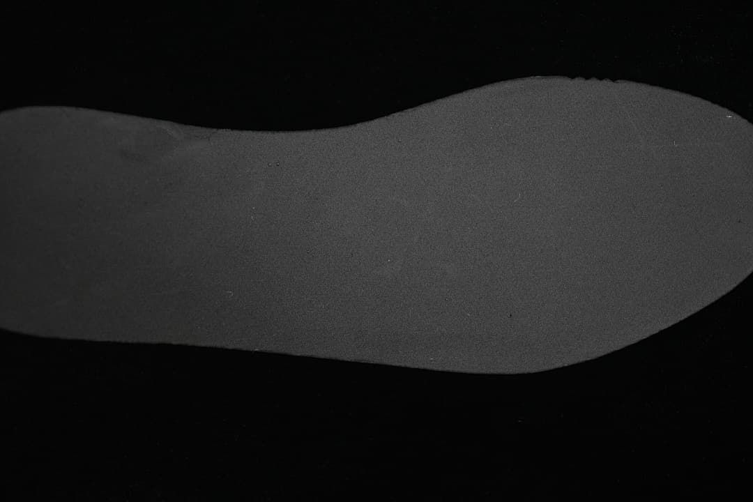 Close-up of the sneaker's dark outsole