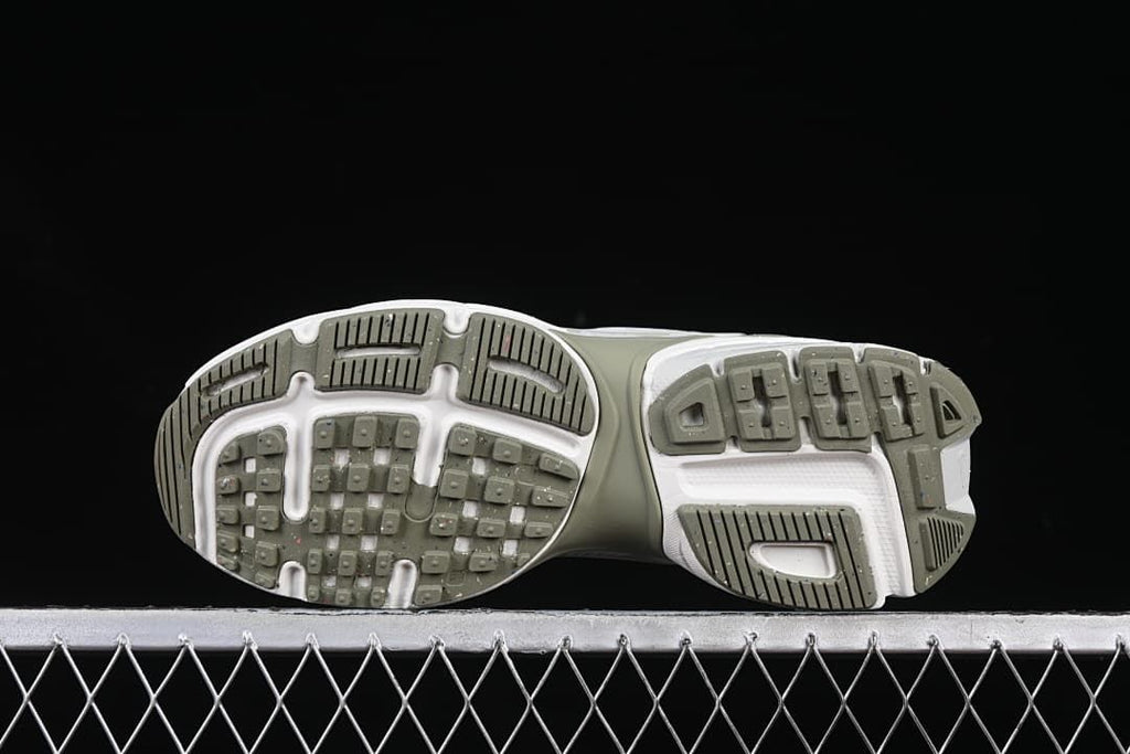 Underside view showing the patterned outsoles