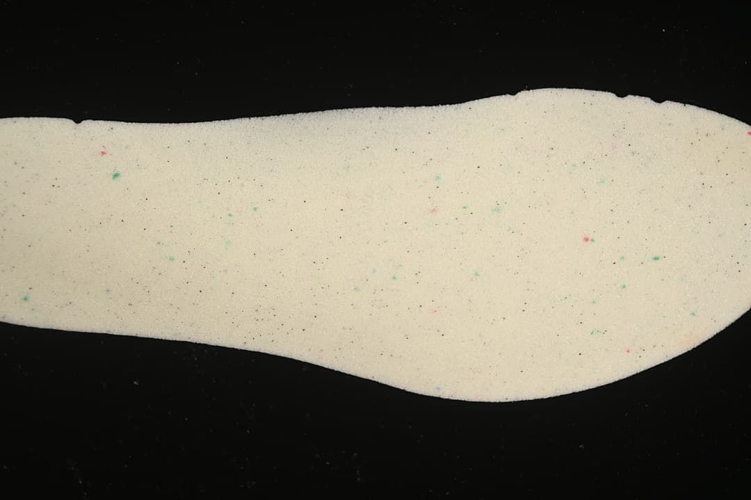 Light-colored shoe insole shown from above.
