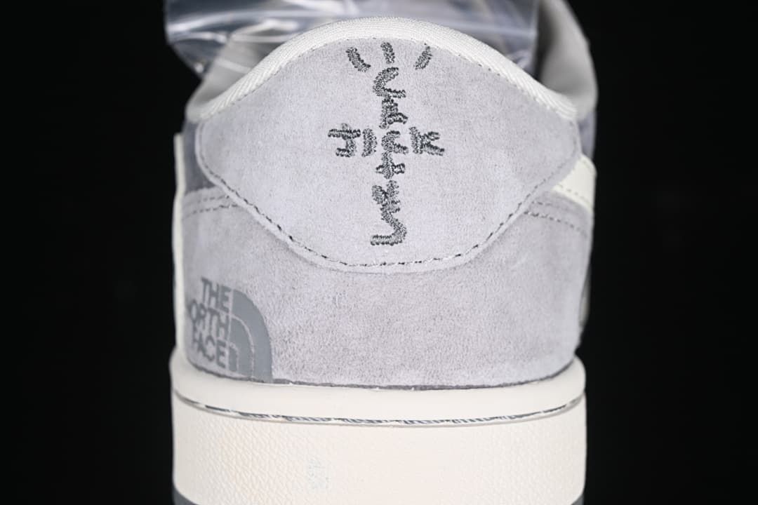 Rear view showing gray heel panels and branded details