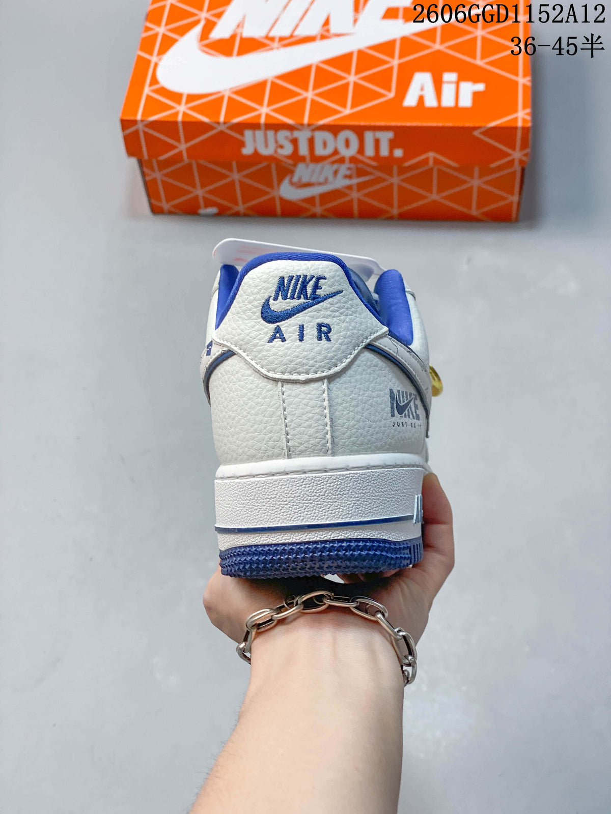 Rear view of the sneaker showing blue heel branding and outsole