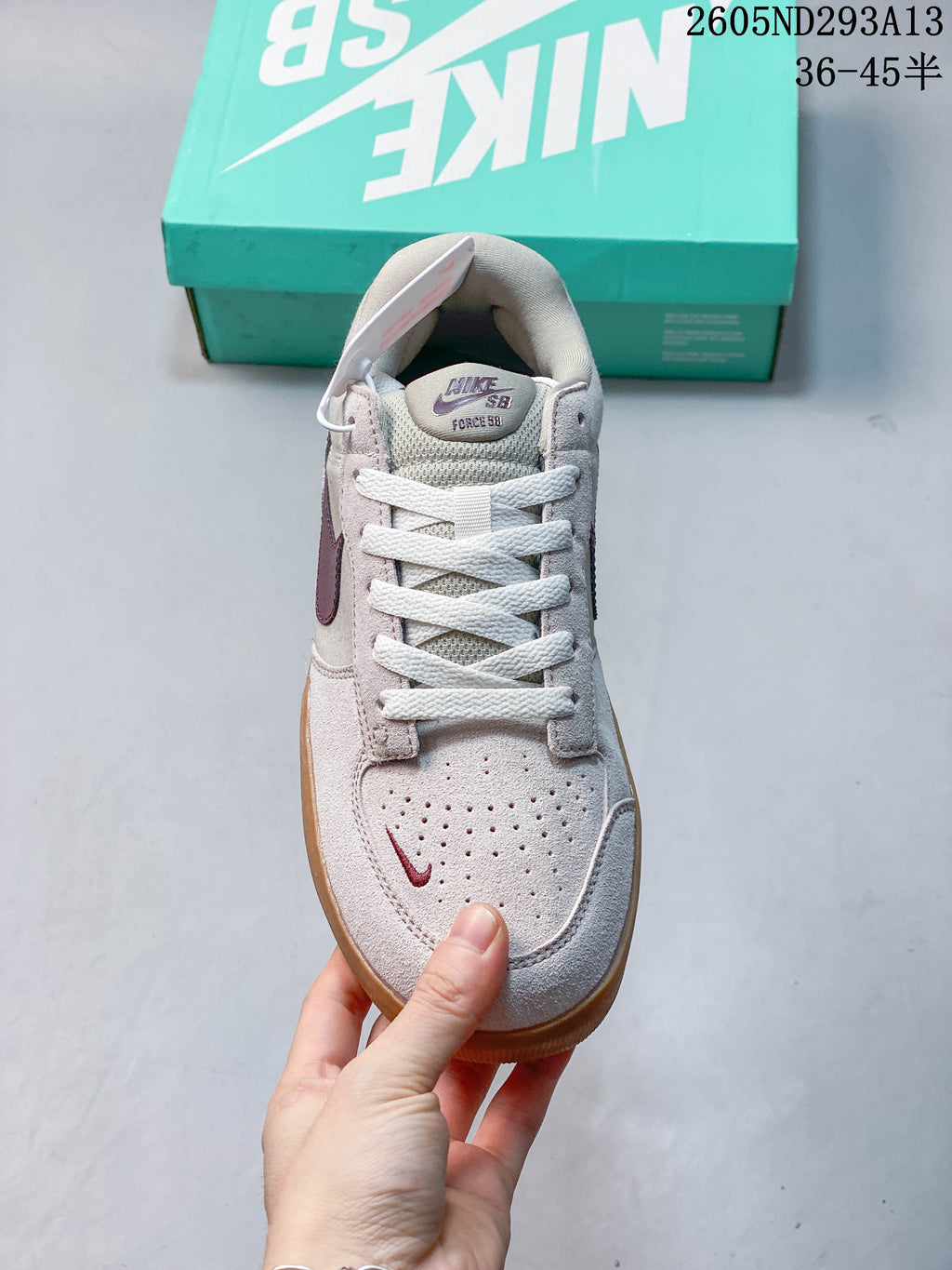 Front view of a Nike SB Force 58 shoe showing its perforated toe and lace-up design