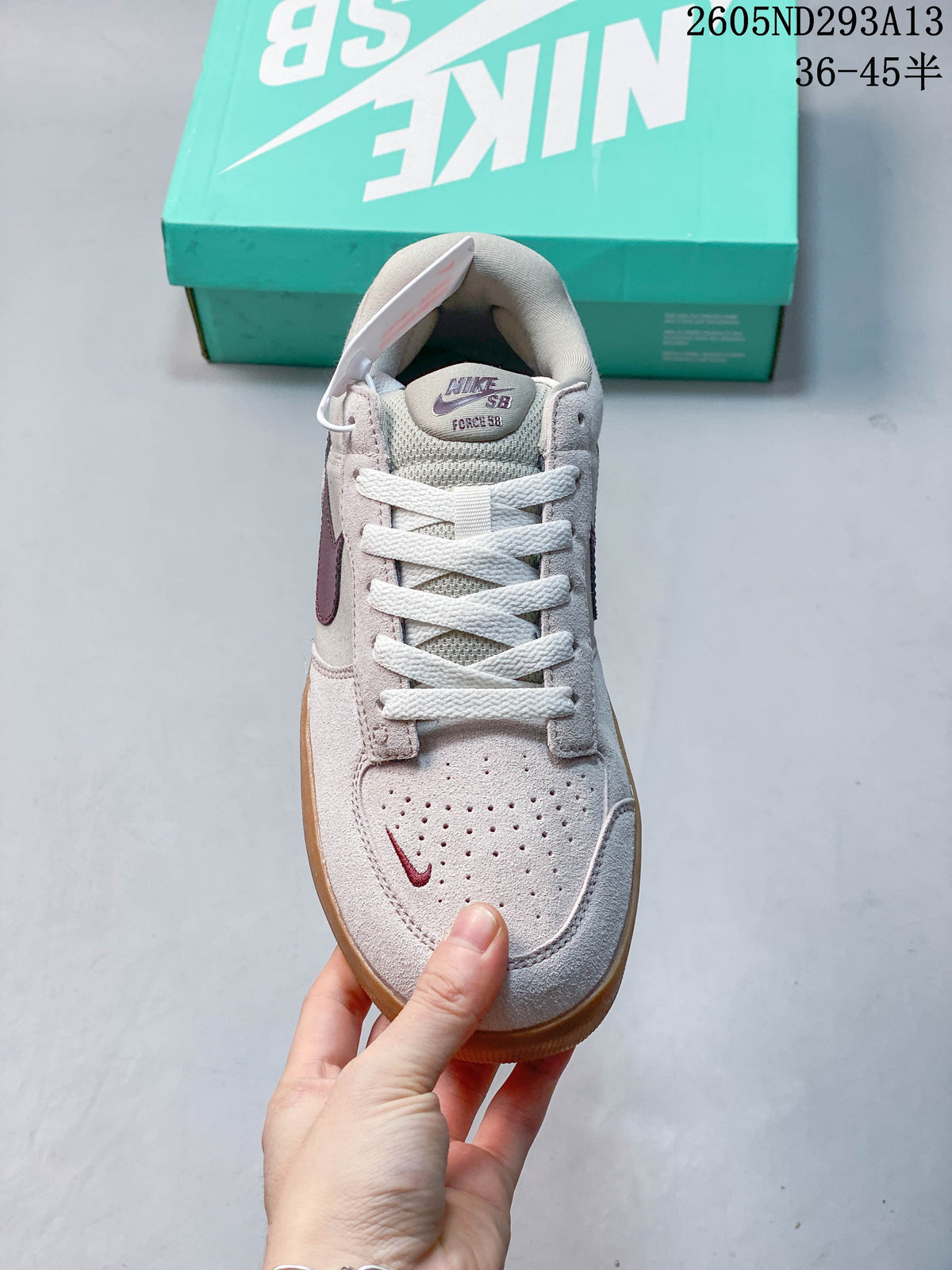 Front view of a Nike SB Force 58 shoe showing its perforated toe and lace-up design