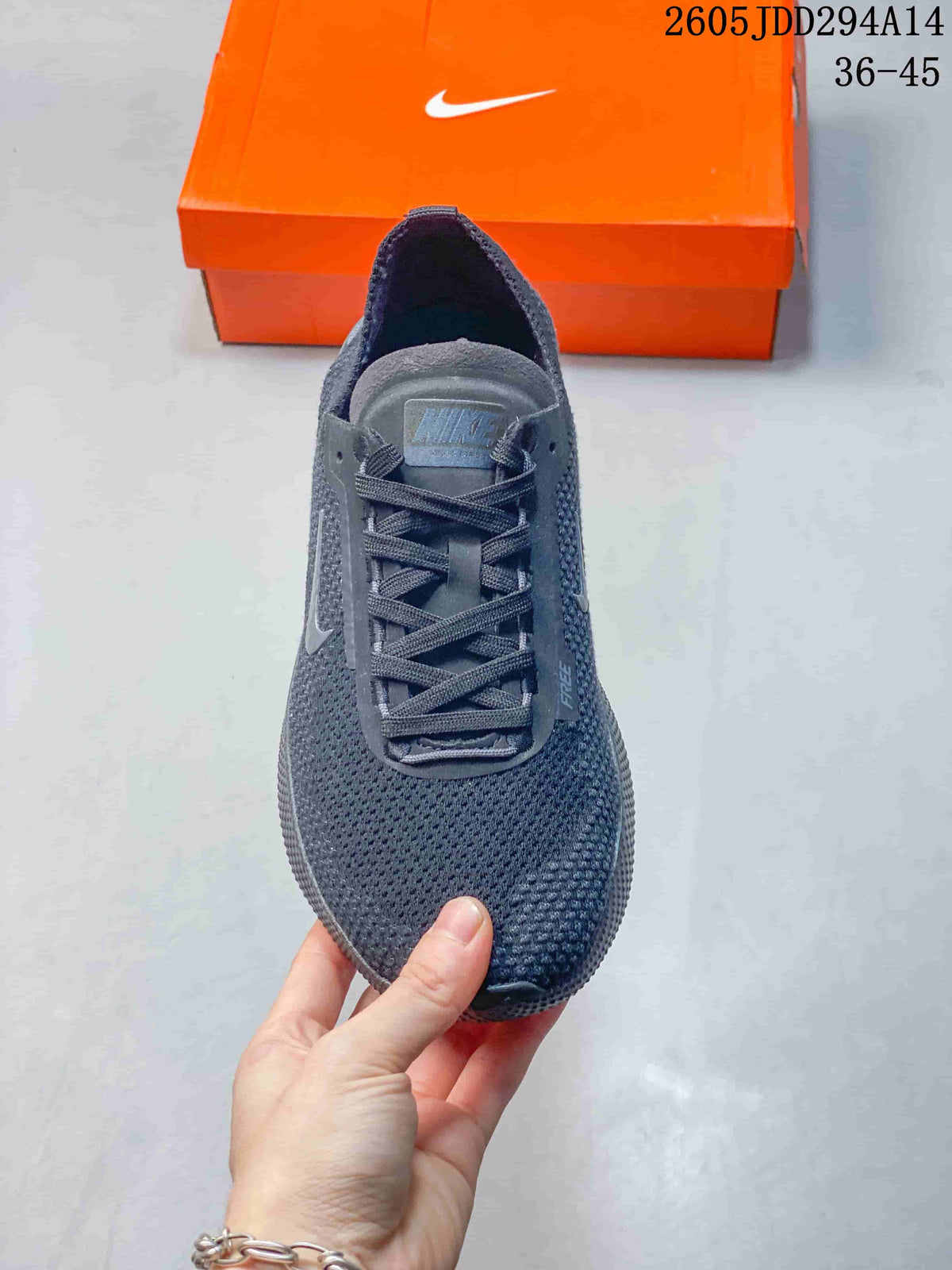 Top view of the dark gray lace-up shoe showing its textured upper