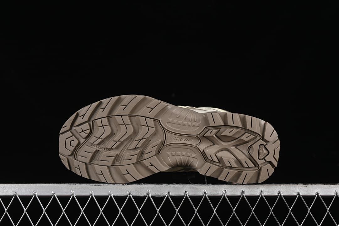 Underside view showing the trail outsole tread