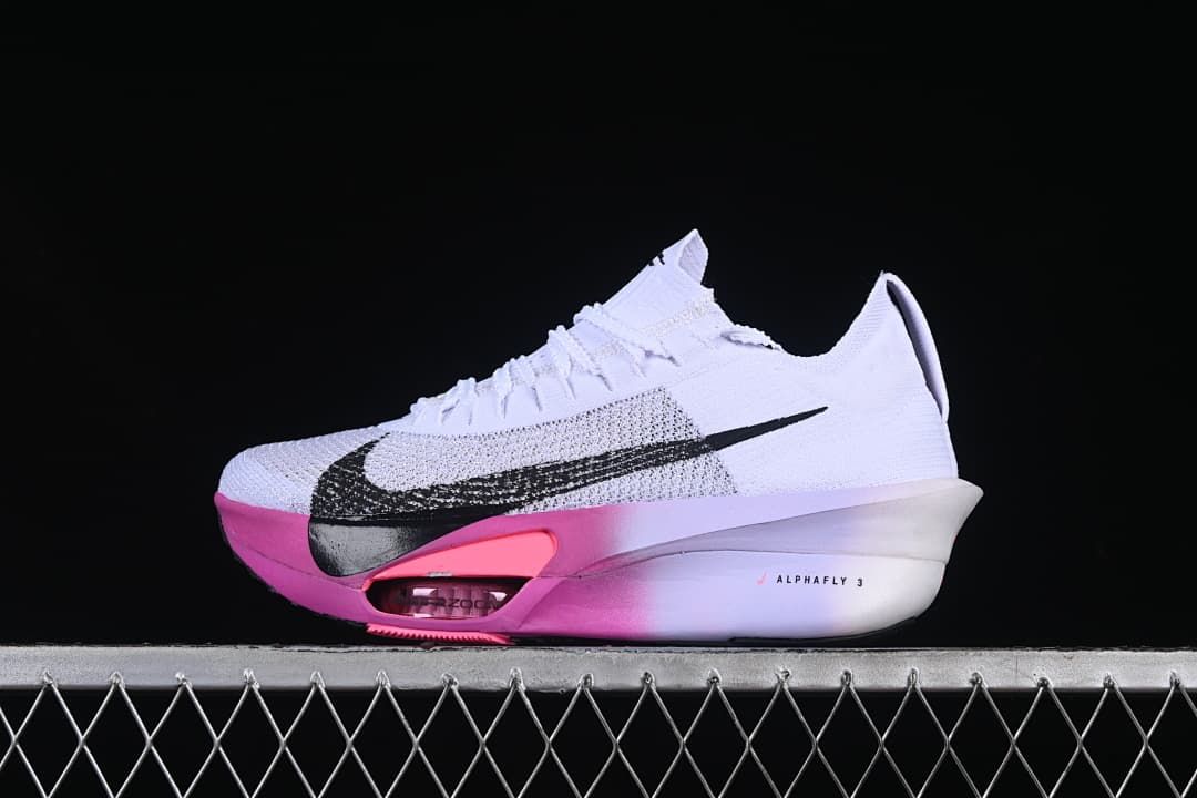 Side view of the white Nike Alphafly 3 with black Swoosh and pink sole
