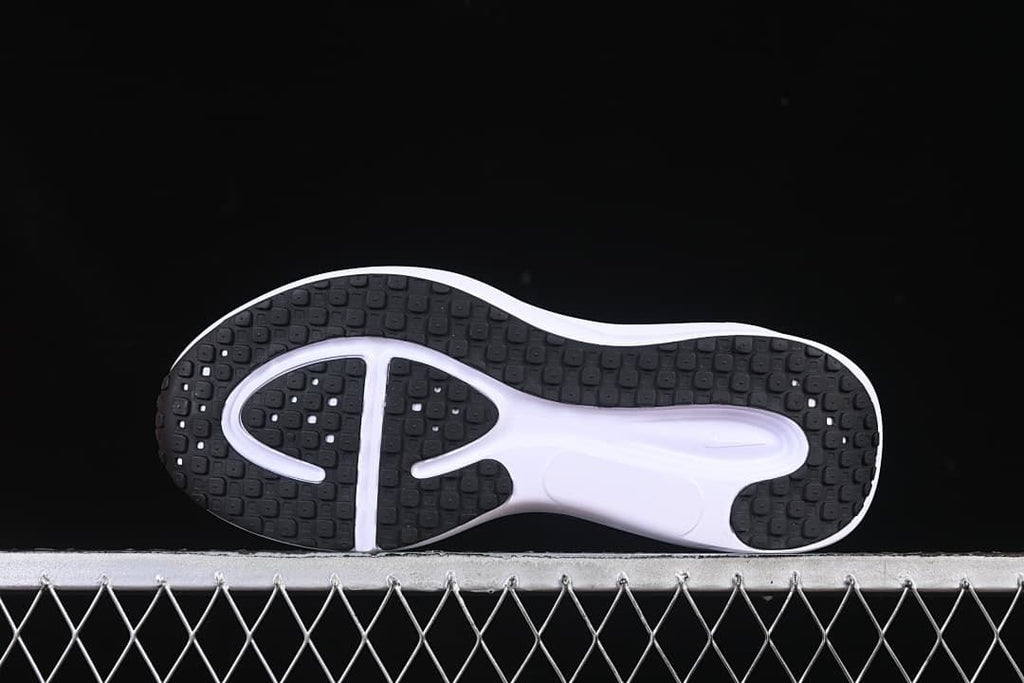 Underside view showing the black patterned outsole