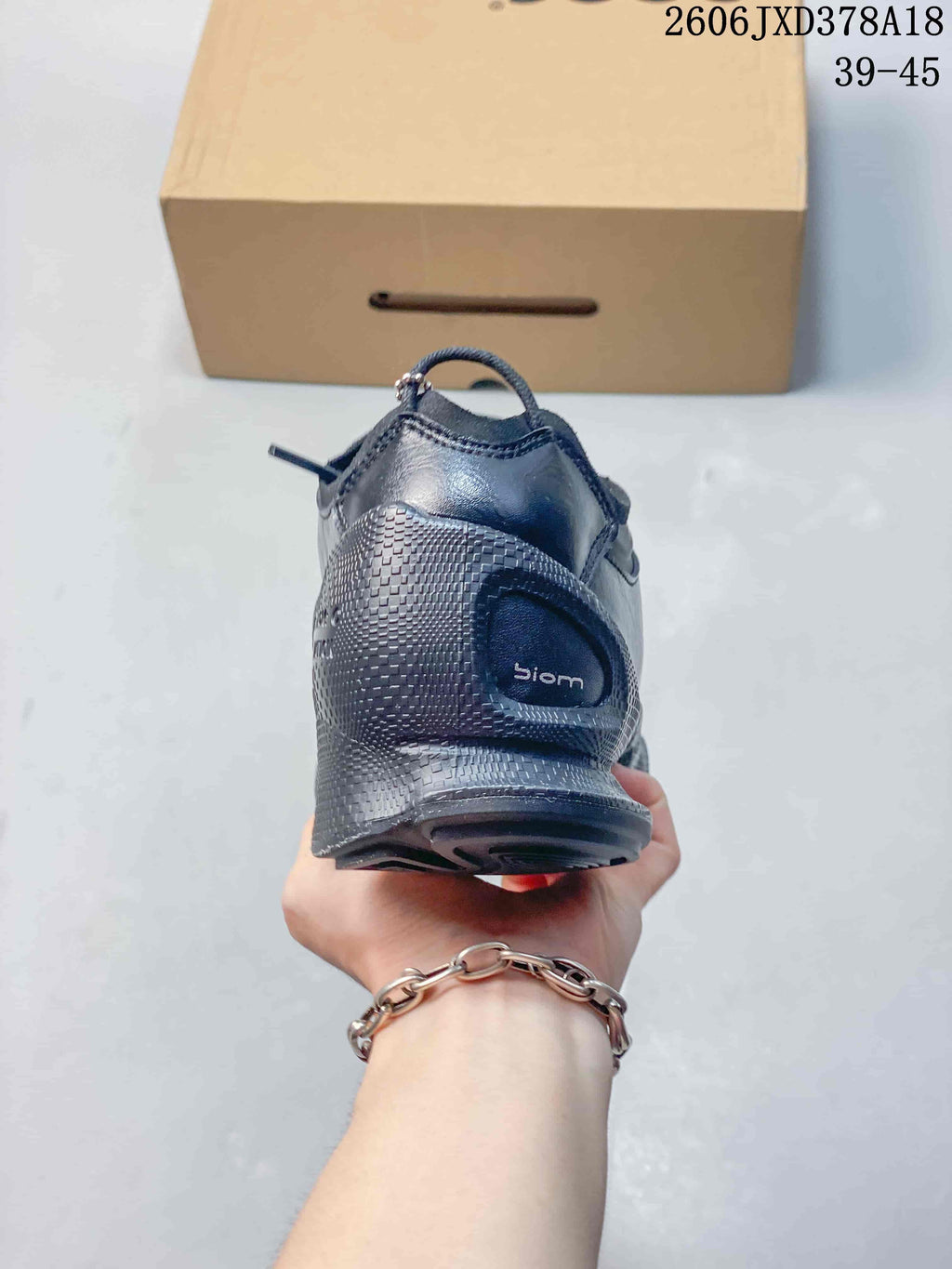 Rear view of a black ECCO BIOM sneaker