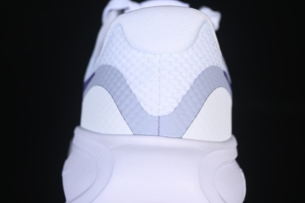 Rear view showing the white and gray heel details