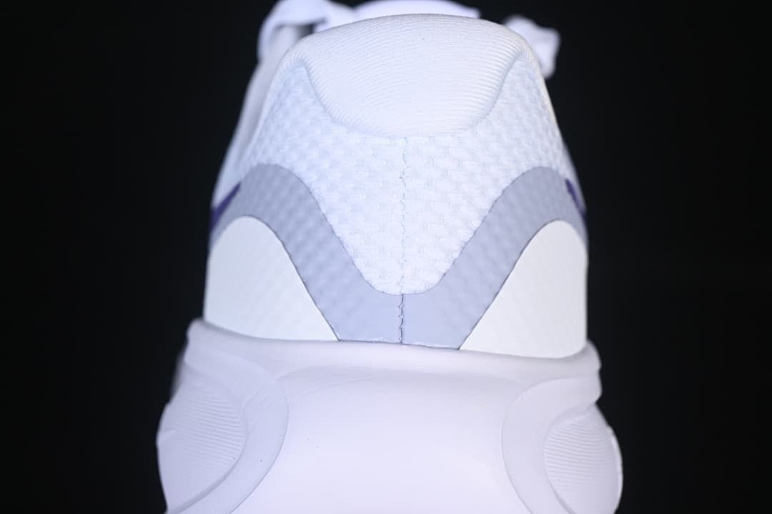 Rear view showing the white and gray heel details