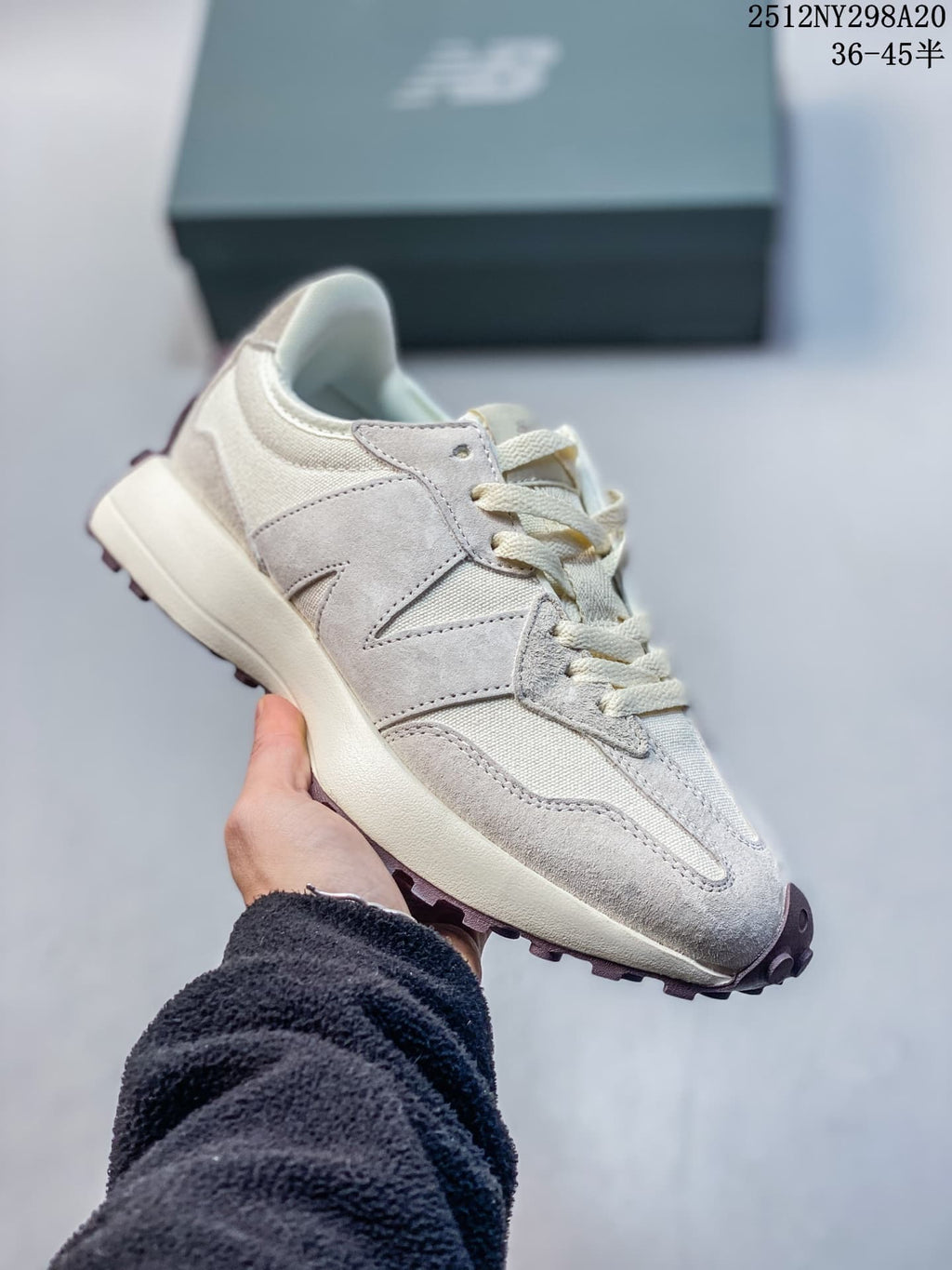 New Balance 327-style sneaker in light gray and cream with a lugged outsole
