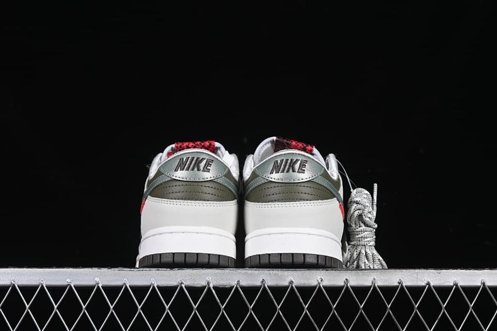 Rear view of both shoes showing the heel branding and dark outsoles.