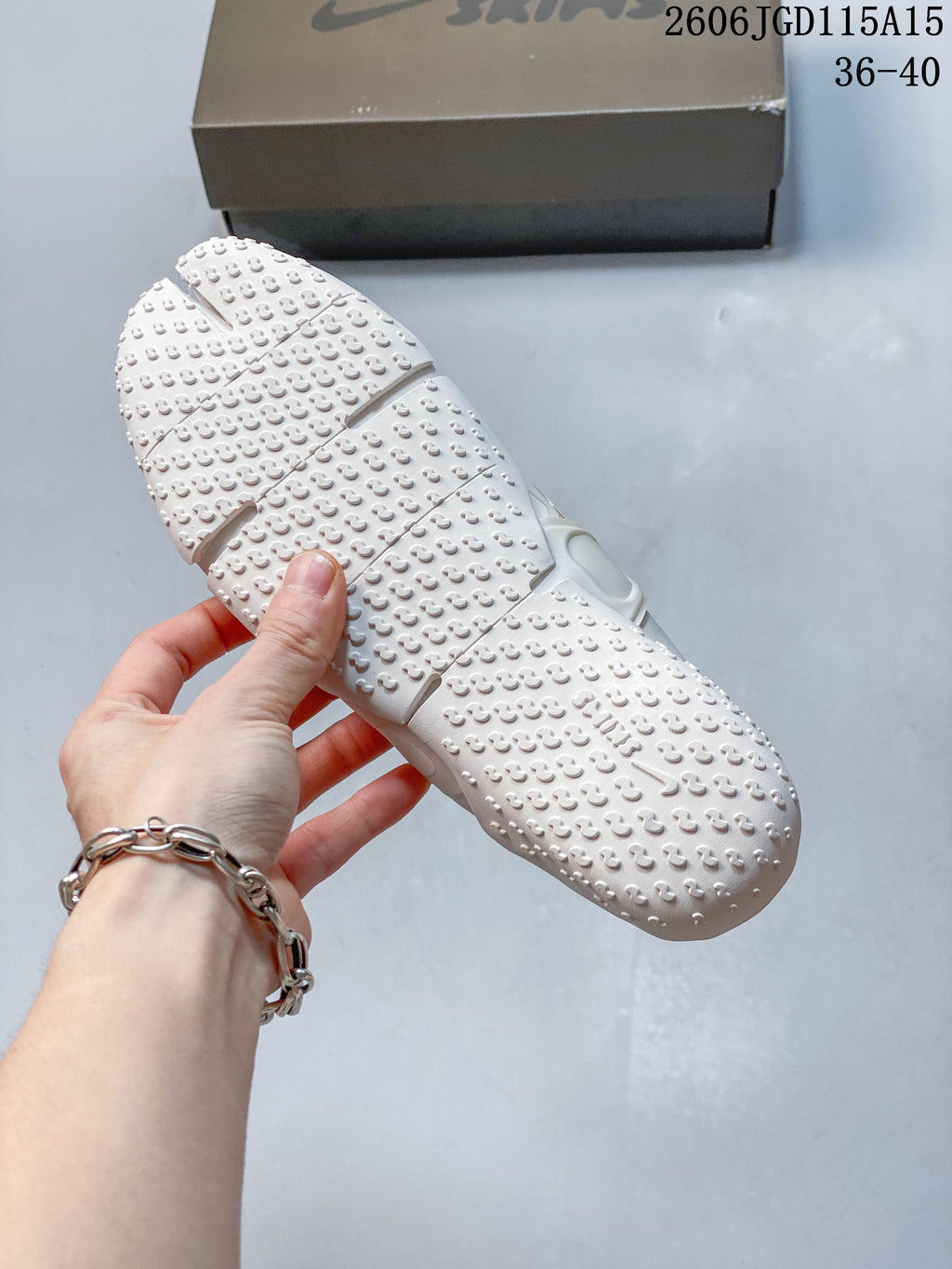 Underside of a Nike Air Rift shoe showing its textured outsole