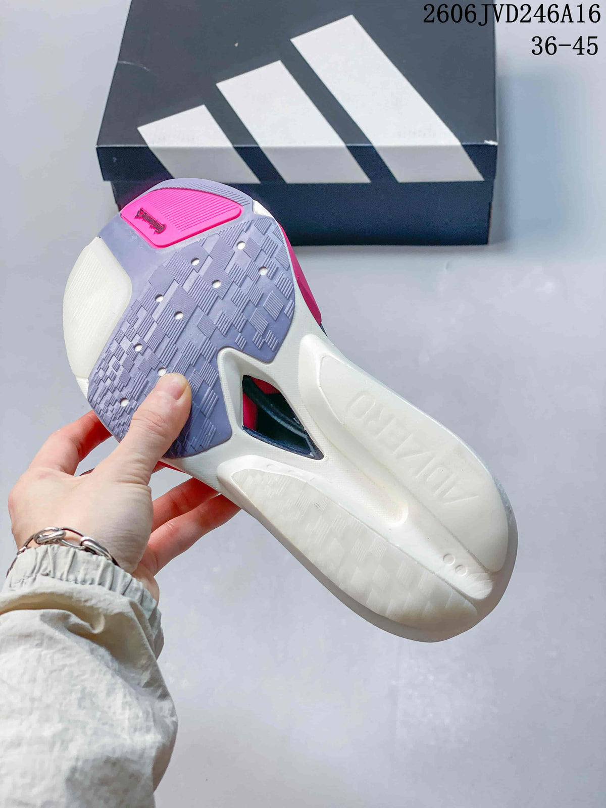 Underside of the running shoe showing a lavender outsole, white sole, and pink heel accent