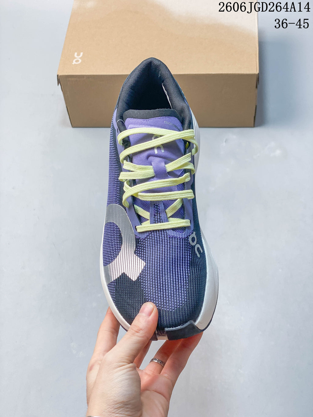 Top view of the running shoe showing its patterned upper and contrasting laces.