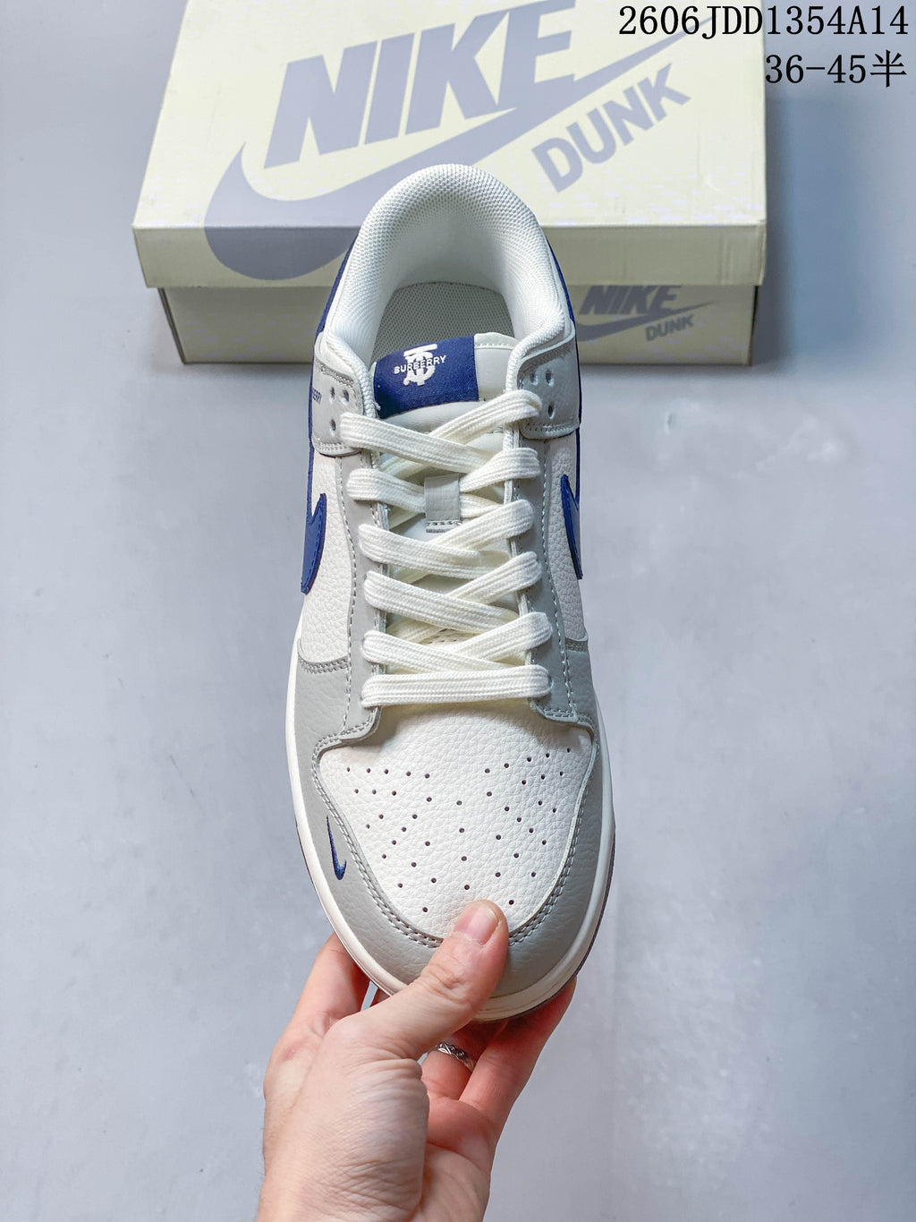 Top view showing white laces and a perforated toe panel
