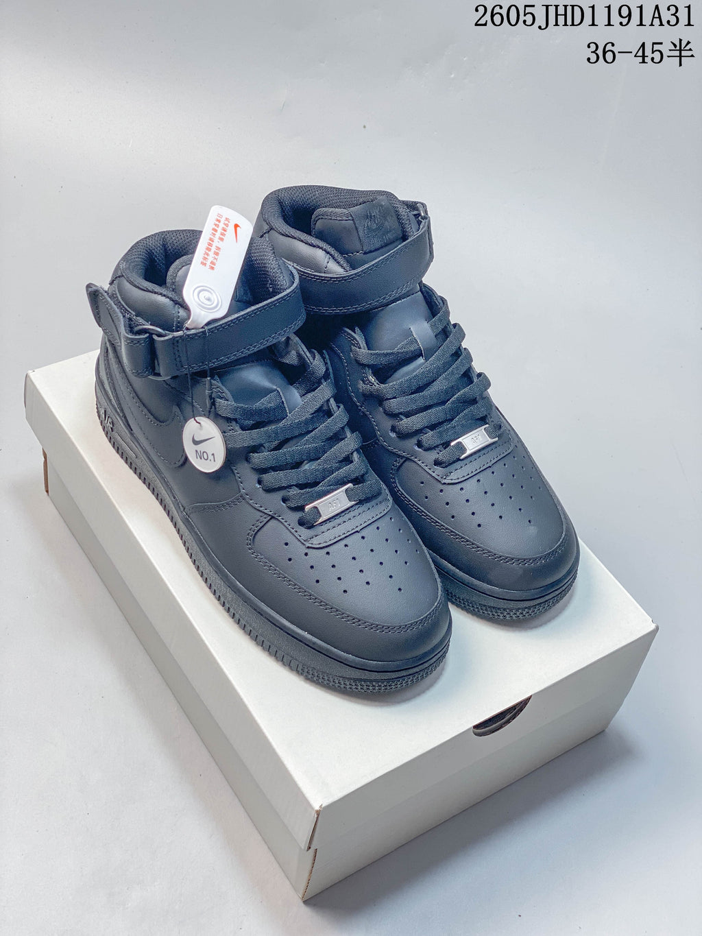 Dark navy Nike Air Force 1-style high-top sneakers with ankle straps