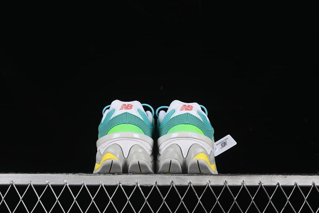 Rear view of the pair showing lime heel accents and sculpted soles