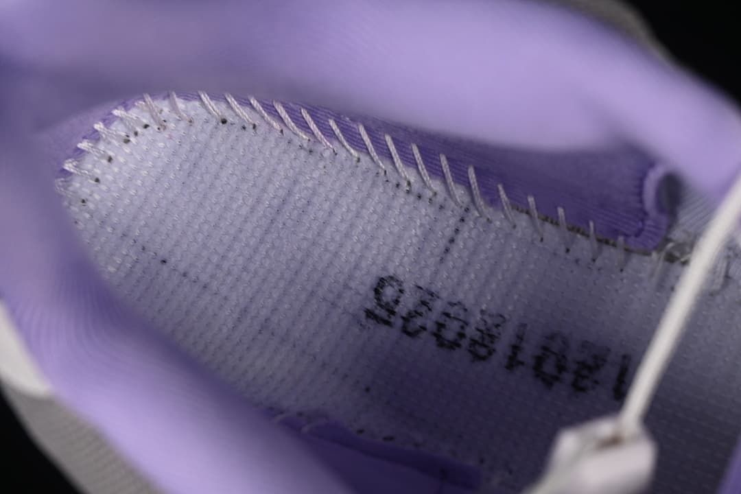 Close-up of the lavender shoe interior and printed size marking.