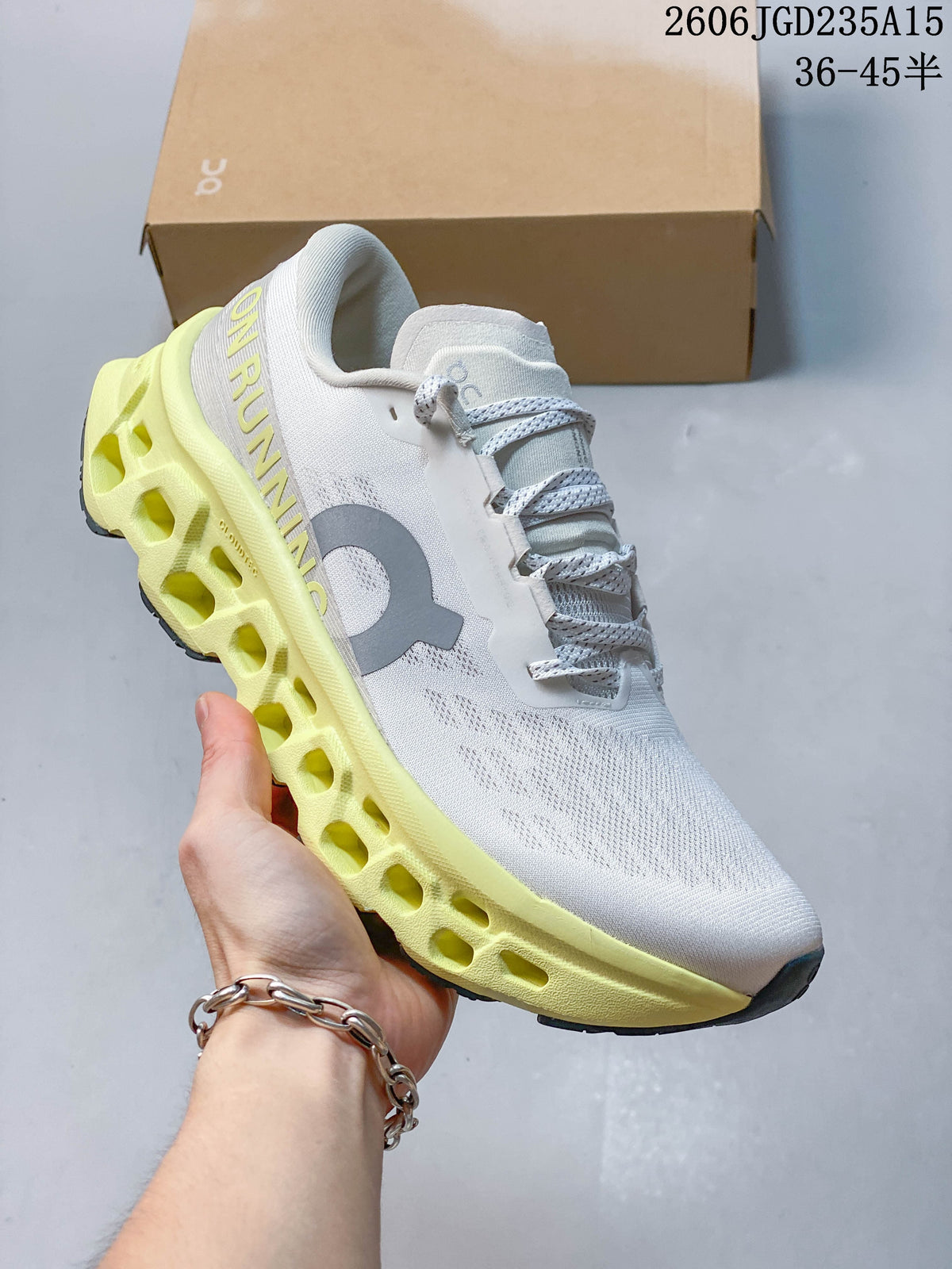 Angled side view showing On branding and the pale yellow sole