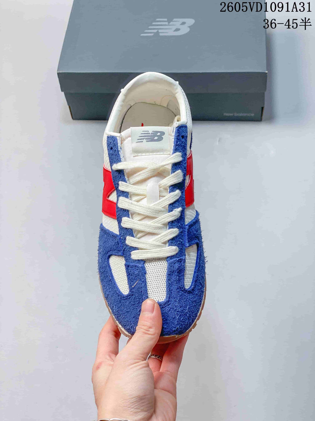 Top view of the sneaker showing its laces and contrasting upper panels