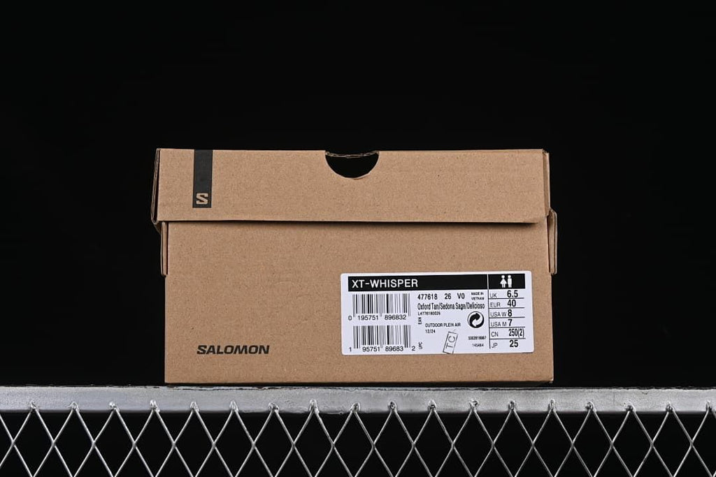 Salomon XT-Whisper shoe box label showing model and sample size information.