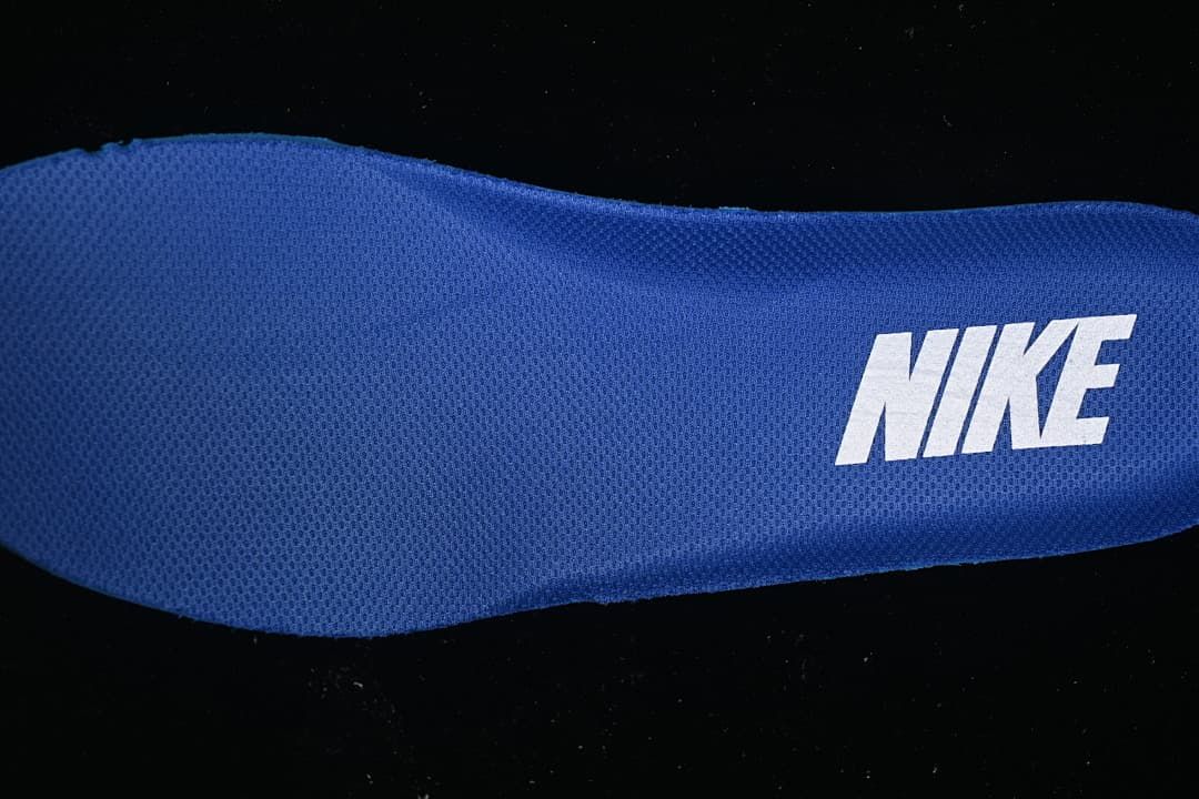 Blue shoe insert with Nike branding