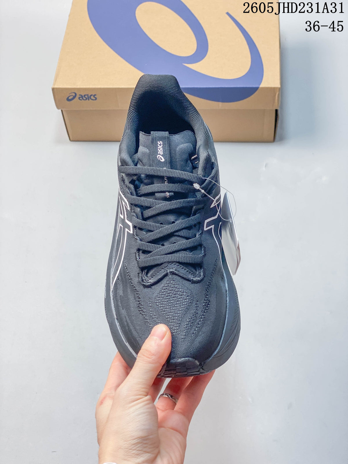 Front view of a dark gray lace-up running shoe