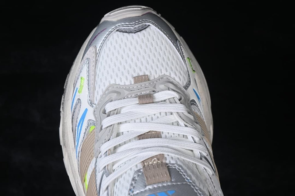 Top-down view of the mesh-look toe, laces, and layered overlays.