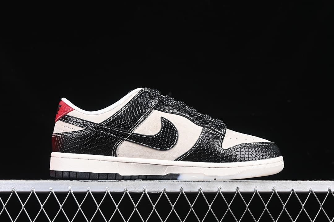 Side profile of the low-top sneaker with black patterned overlays