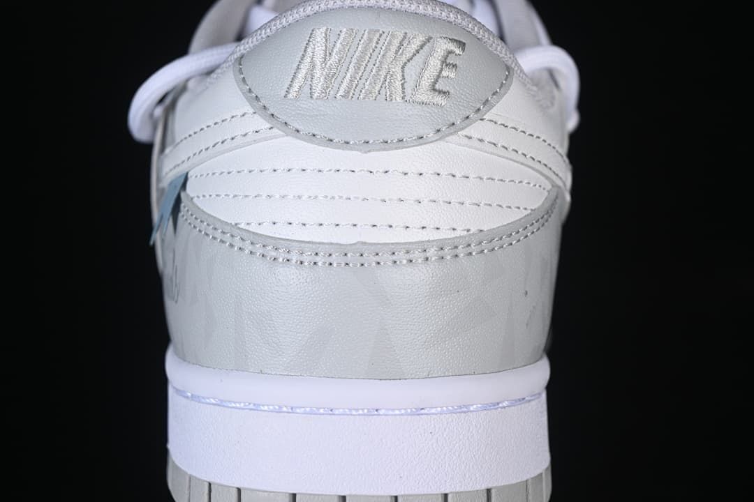 Close-up of the heel with Nike branding and layered panels