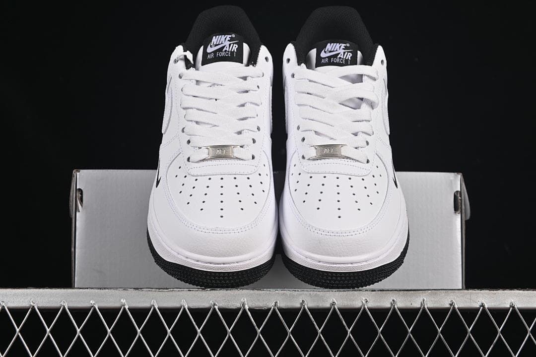 Front view of the pair showing perforated toe boxes and white laces