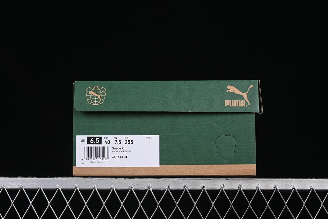 Green Puma shoe box labeled Suede XL, Puma black/silver, and product code 401413 01.