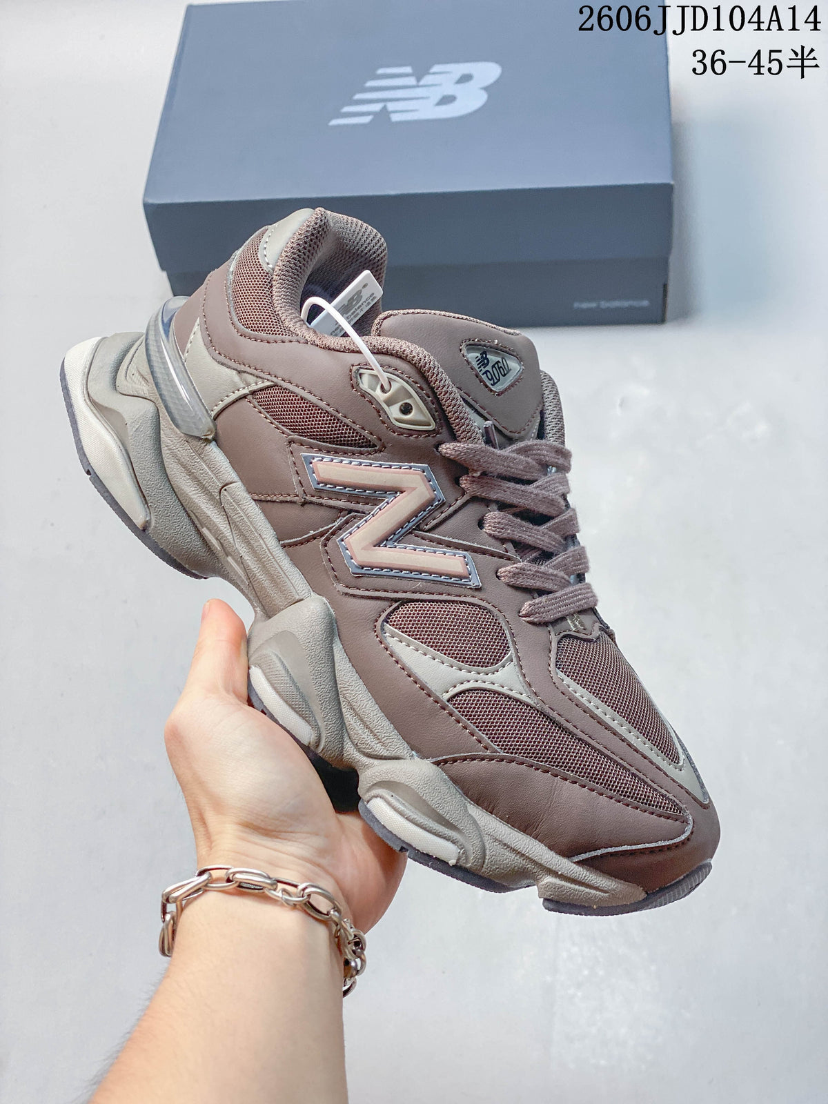 Mauve and taupe New Balance 9060 sneaker shown from the side.