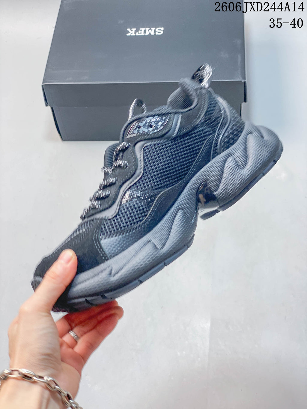 Side view highlighting mesh panels and the sculpted sole
