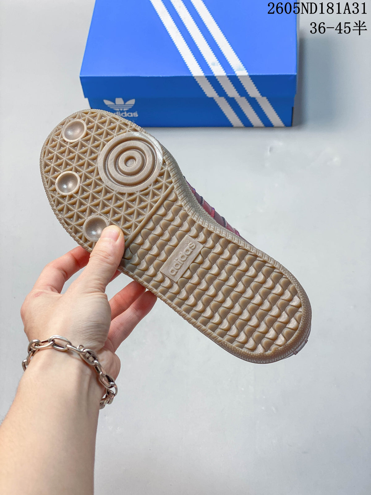 Underside of a sneaker showing the gum-colored patterned outsole