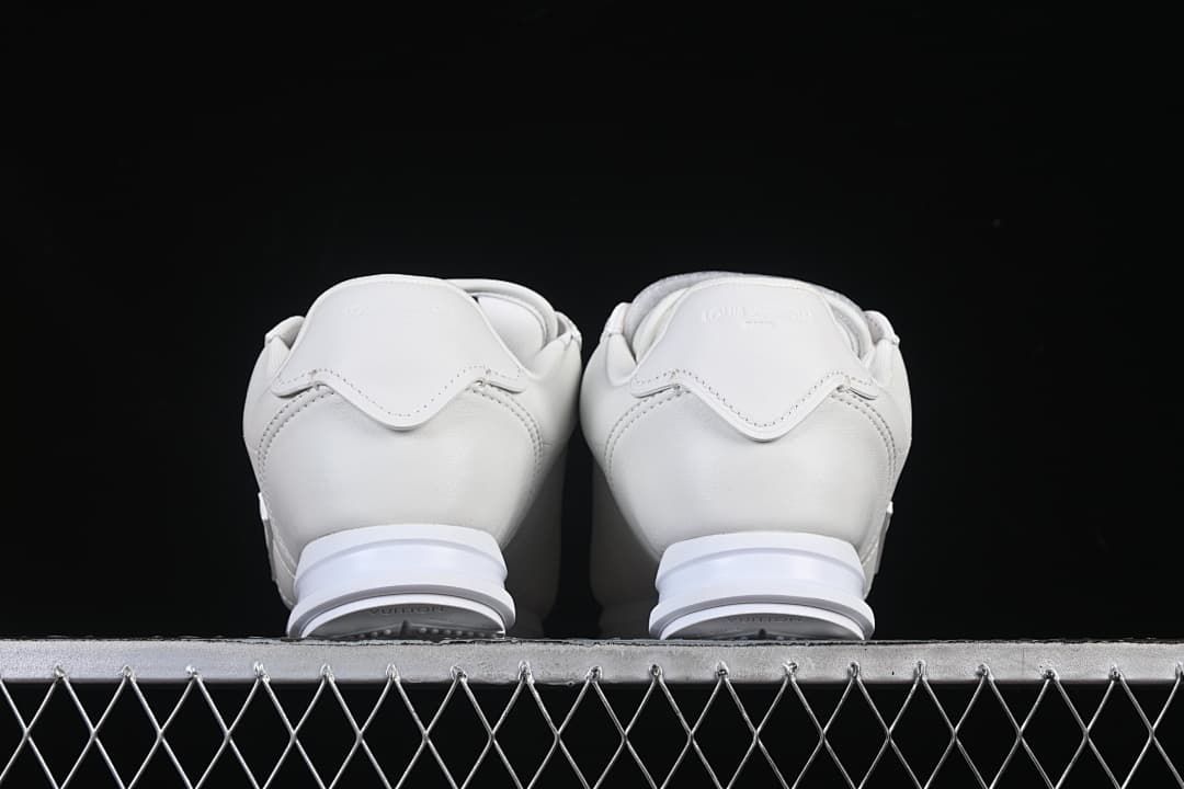 Rear view of the pair showing heel panels and soles