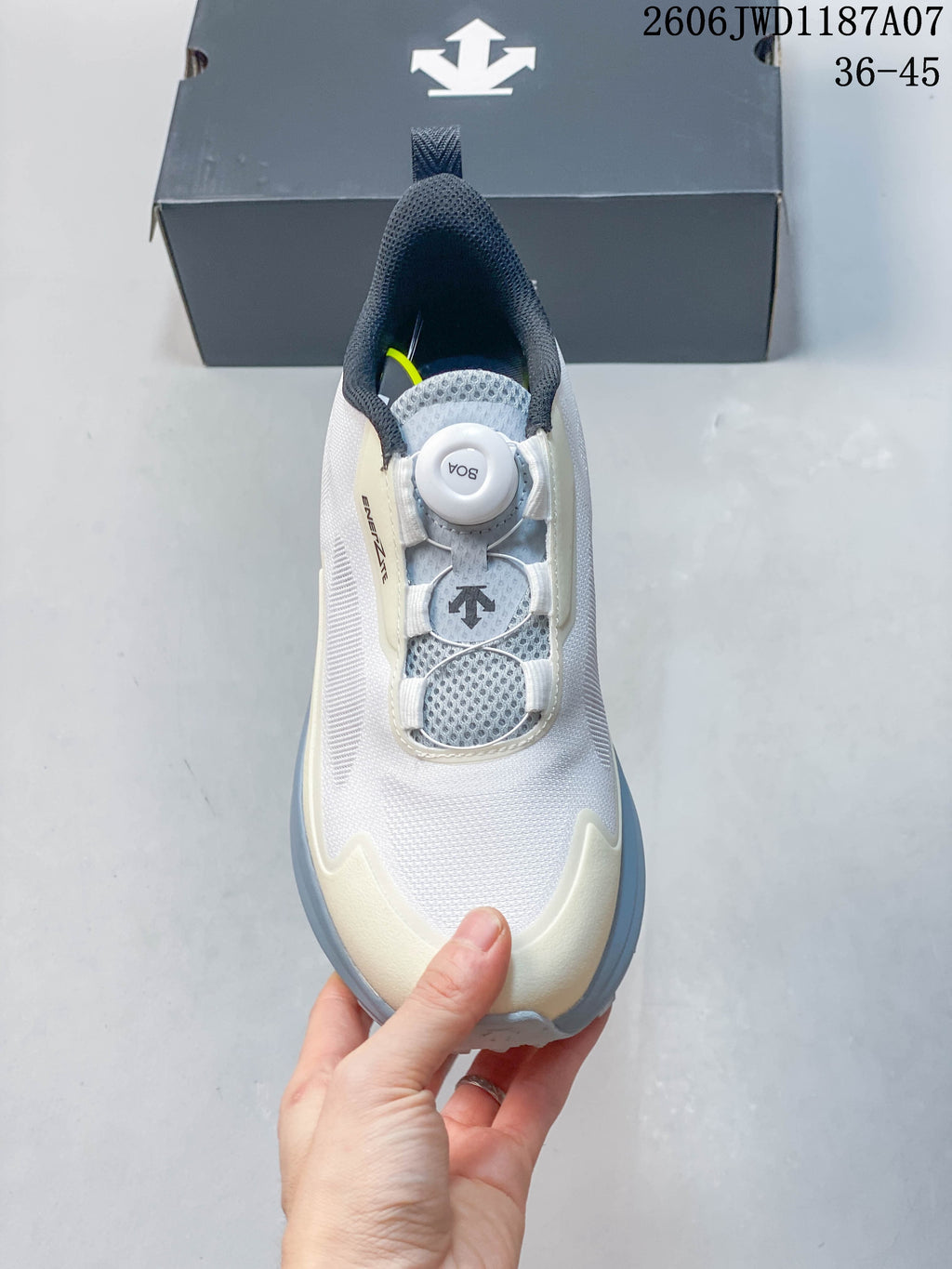 Top view showing the sneaker's dial-style closure and mesh-look upper.